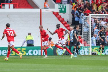 Cheikhou Kouyate #21 of Nottingham Forest celebrates his goal to make it 1-0 during the Premier League match Nottingham Forest vs Bournemouth at City Ground, Nottingham, United Kingdom, 3rd September 202