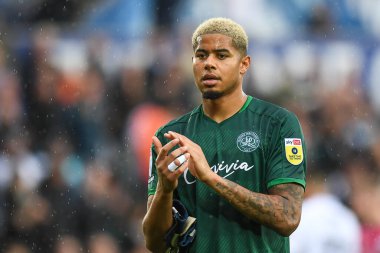 Seny Dieng #1 of QPRApplauds the travelling supporters during the Sky Bet Championship match Swansea City vs Queens Park Rangers at Swansea.com Stadium, Swansea, United Kingdom, 3rd September 202