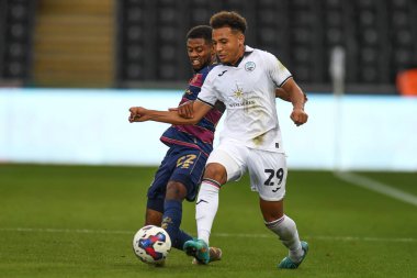 Matthew Sorinola #29 of Swansea City Kenneth Paal #22 of QPR during the Sky Bet Championship match Swansea City vs Queens Park Rangers at Swansea.com Stadium, Swansea, United Kingdom, 3rd September 202