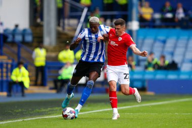 Dominic Iorfa #6 of Sheffield Wednesday and Ryan Galvin #27 of Sheffield Wednesday during the Sky Bet League 1 match Sheffield Wednesday vs Barnsley at Hillsborough, Sheffield, United Kingdom, 3rd September 2022