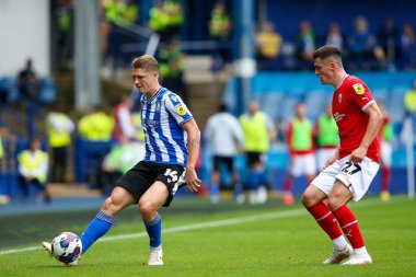 George Byers #14 of Sheffield Wednesday and Jack Aitchison #27 of Barnsley during the Sky Bet League 1 match Sheffield Wednesday vs Barnsley at Hillsborough, Sheffield, United Kingdom, 3rd September 202