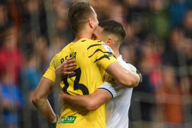 Steven Benda #13 of Swansea City and Matt Grimes #8 of Swansea City embrace at the final whistle during the Sky Bet Championship match Swansea City vs Queens Park Rangers at Swansea.com Stadium, Swansea, United Kingdom, 3rd September 202