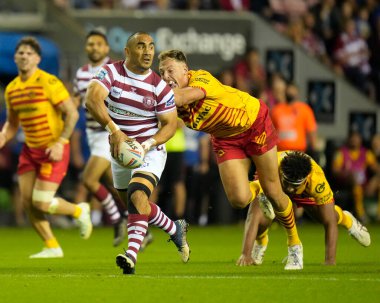 Thomas Leuluai #7 of Wigan Warriors passes the ball during the Betfred Super League match Wigan Warriors vs Catalans Dragons at DW Stadium, Wigan, United Kingdom, 2nd September 202