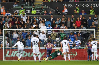 Seny Dieng #1 of QPR saves a penalty from Jol Piroe #17 of Swansea City during the Sky Bet Championship match Swansea City vs Queens Park Rangers at Swansea.com Stadium, Swansea, United Kingdom, 3rd September 2022