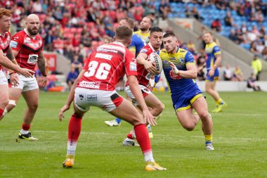 Joe Bullock #15 of Warrington Wolves runs at the Salford Red Devils  defence during the Betfred Super League match Salford Red Devils vs Warrington Wolves at AJ Bell Stadium, Eccles, United Kingdom, 3rd September 202