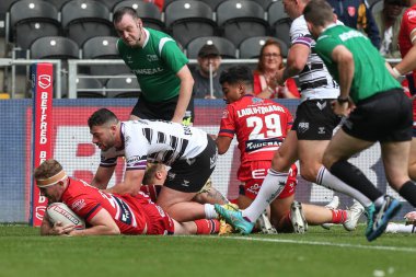 Rowan Milnes #21 of Hull KR  goes over for a try during the Betfred Super League match Hull FC vs Hull KR at MKM Stadium, Hull, United Kingdom, 3rd September 202