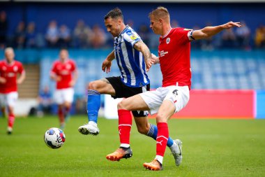 Lee Gregory #9 of Sheffield Wednesday and Mads Andersen #6 of Barnsleyduring the Sky Bet League 1 match Sheffield Wednesday vs Barnsley at Hillsborough, Sheffield, United Kingdom, 3rd September 202