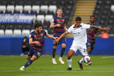 Kyle Naughton #26 of Swansea City  Under pressure from Ilias Chair #10 of QPR during the Sky Bet Championship match Swansea City vs Queens Park Rangers at Swansea.com Stadium, Swansea, United Kingdom, 3rd September 202
