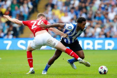 Mallik Wilks #7 of Sheffield Wednesday and Robbie Cundy #24 of Barnsley during the Sky Bet League 1 match Sheffield Wednesday vs Barnsley at Hillsborough, Sheffield, United Kingdom, 3rd September 202
