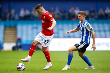 George Byers #14 of Sheffield Wednesday and Jack Aitchison #27 of Barnsleyduring the Sky Bet League 1 match Sheffield Wednesday vs Barnsley at Hillsborough, Sheffield, United Kingdom, 3rd September 202