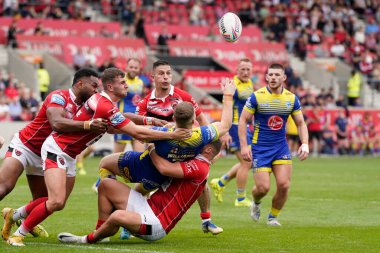 George Williams #7 of Warrington Wolves offloads the ball in the tackle during the Betfred Super League match Salford Red Devils vs Warrington Wolves at AJ Bell Stadium, Eccles, United Kingdom, 3rd September 202