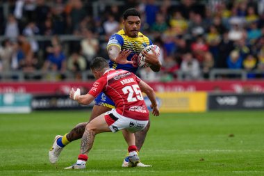 Tom Mikaele #33 of Warrington Wolves runs at Morgan Escare #25 of Salford Red Devils during the Betfred Super League match Salford Red Devils vs Warrington Wolves at AJ Bell Stadium, Eccles, United Kingdom, 3rd September 202