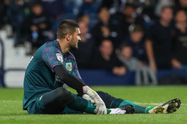 Arijanet Muri #49 of Burnley goes down injured during the Sky Bet Championship match West Bromwich Albion vs Burnley at The Hawthorns, West Bromwich, United Kingdom, 2nd September 2022