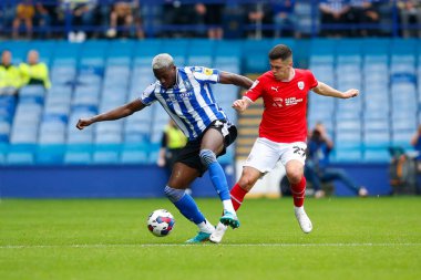 Dominic Iorfa #6 of Sheffield Wednesday and Jack Aitchison #27 of Barnsley during the Sky Bet League 1 match Sheffield Wednesday vs Barnsley at Hillsborough, Sheffield, United Kingdom, 3rd September 202