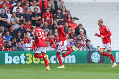Cheikhou Kouyate #21 of Nottingham Forest celebrates his goal to make it 1-0 during the Premier League match Nottingham Forest vs Bournemouth at City Ground, Nottingham, United Kingdom, 3rd September 202