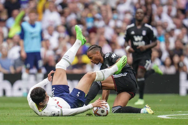 Bobby Reid #14 of Fulham fouls Son Heung-Min #7 of Tottenham Hotspur during the Premier League match Tottenham Hotspur vs Fulham at Tottenham Hotspur Stadium, London, United Kingdom, 3rd September 202