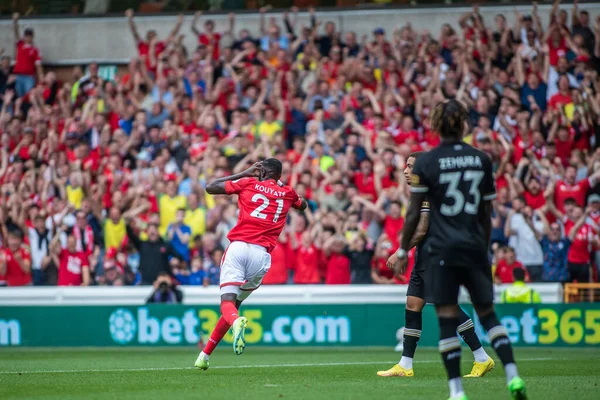 Cheikhou Kouyat #21 of Nottingham Forest sets off in celebration after scoring during the Premier League match Nottingham Forest vs Bournemouth at City Ground, Nottingham, United Kingdom, 3rd September 2022