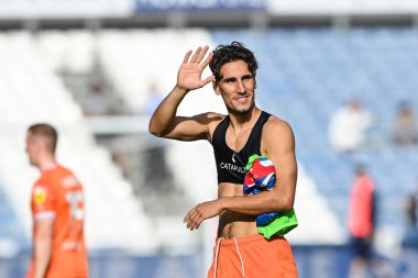 Theo Corbeanu #25 of Blackpool applauds the fans at the end of the Sky Bet Championship match Huddersfield Town vs Blackpool at John Smith's Stadium, Huddersfield, United Kingdom, 4th September 202