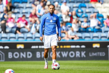 Sorba Thomas #7 of Huddersfield Town warms up before the Sky Bet Championship match Huddersfield Town vs Blackpool at John Smith's Stadium, Huddersfield, United Kingdom, 4th September 202