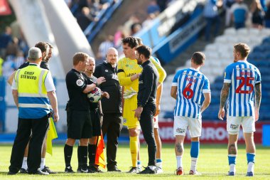 Danny Schofield manager of Huddersfield Town protests to the referee after the Sky Bet Championship match Huddersfield Town vs Blackpool at John Smith's Stadium, Huddersfield, United Kingdom, 4th September 202