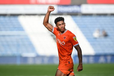 Jordan Lawrence-Gabriel #4 of Blackpool celebrates with the fans at the end of the Sky Bet Championship match Huddersfield Town vs Blackpool at John Smith's Stadium, Huddersfield, United Kingdom, 4th September 202