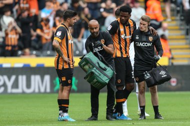 Benjamin Tetteh #30 of Hull City is helped off the pitch during the Sky Bet Championship match Hull City vs Sheffield United at MKM Stadium, Hull, United Kingdom, 4th September 202