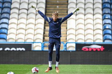 Daniel Grimshaw #32 of Blackpool warms up ahead of the Sky Bet Championship match Huddersfield Town vs Blackpool at John Smith's Stadium, Huddersfield, United Kingdom, 4th September 202