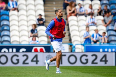 Jon Russell #5 of Huddersfield Town warms up before the Sky Bet Championship match Huddersfield Town vs Blackpool at John Smith's Stadium, Huddersfield, United Kingdom, 4th September 202