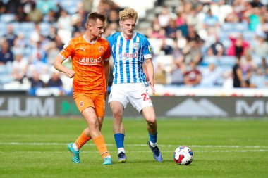 Callum Connolly #2 of Blackpool and Jack Rudoni #22 of Huddersfield Town during the Sky Bet Championship match Huddersfield Town vs Blackpool at John Smith's Stadium, Huddersfield, United Kingdom, 4th September 202
