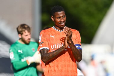 Marvin Ekpiteta #21 of Blackpool applauds the fans at the end of the Sky Bet Championship match Huddersfield Town vs Blackpool at John Smith's Stadium, Huddersfield, United Kingdom, 4th September 202