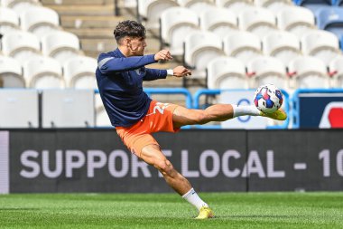 Theo Corbeanu #25 of Blackpool warms up ahead of the Sky Bet Championship match Huddersfield Town vs Blackpool at John Smith's Stadium, Huddersfield, United Kingdom, 4th September 202
