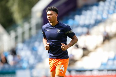 Jordan Lawrence-Gabriel #4 of Blackpool warms up before the Sky Bet Championship match Huddersfield Town vs Blackpool at John Smith's Stadium, Huddersfield, United Kingdom, 4th September 202