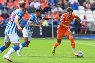 Theo Corbeanu #25 of Blackpool makes a break with the ball during the Sky Bet Championship match Huddersfield Town vs Blackpool at John Smith's Stadium, Huddersfield, United Kingdom, 4th September 202