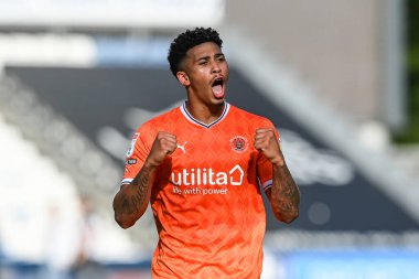 Jordan Lawrence-Gabriel #4 of Blackpool celebrates with the fans at the end of the Sky Bet Championship match Huddersfield Town vs Blackpool at John Smith's Stadium, Huddersfield, United Kingdom, 4th September 202