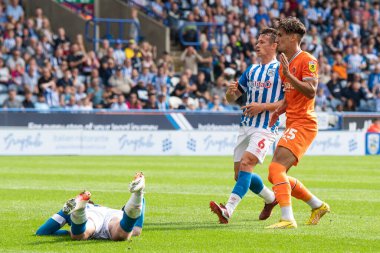 Theo Corbeanu #25 of Blackpool scores to make it 0-1 during the Sky Bet Championship match Huddersfield Town vs Blackpool at John Smith's Stadium, Huddersfield, United Kingdom, 4th September 202