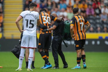 Benjamin Tetteh #30 of Hull City goes off injured during the first half of the Sky Bet Championship match Hull City vs Sheffield United at MKM Stadium, Hull, United Kingdom, 4th September 202