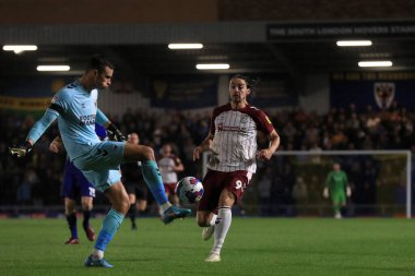 AFC Wimbledon 'dan Nik Tzanev 13 Eylül 2022' de Merton, Birleşik Krallık 'taki Cherry Red Records Stadyumu' nda oynanan Sky Bet 2 karşılaşmasında Northampton City 'den 9 numaralı Louis Appr' dan ayrıldı.
