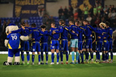 AFC Wimbledon, 13 Eylül 202 'de, Birleşik Krallık' ın Cherry Red Records Stadyumu 'nda oynanan Sky Bet 2 karşılaşmasında merhum Kraliçe II. Elizabeth' e saygılarını sundu.