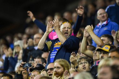 Bir Leeds taraftarı, 16 Eylül 202 'de İngiltere' nin Wigan Stadyumu 'nda oynanan Betfred Süper Ligi karşılaşmasında Wigan Warriors - Leeds Rhinos maçını kutluyor.