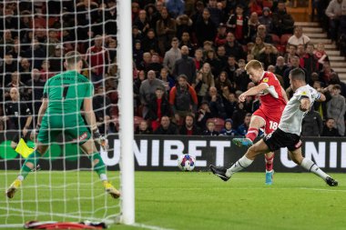 Middlesbrough 'dan Duncan Watmore şutunu atıyor ama 17 Eylül 202' de Middlesbrough, İngiltere 'deki Riverside Stadyumu' nda oynanan Middlesbrough-Rotherham United maçında engelleniyor.