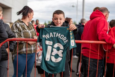 Middlesbrough 'un genç bir taraftarı, 17 Eylül 202' de Middlesbrough, İngiltere 'de oynanan Riverside Stadyumu' nda Middlesbrough-Rotherham United maçında Sky Bet Şampiyonası öncesinde Duncan Watmore # 18 'lik bir tişört giyiyor.