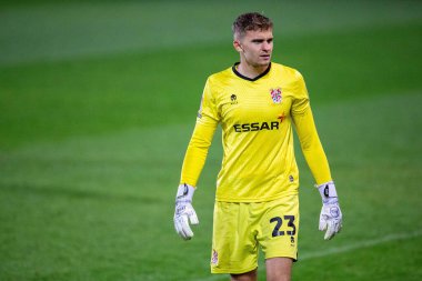 Tranmere Rovers 'ın 23 numaralı oyuncusu Mateusz Hewelt, 20 Eylül 202' de Birkenhead, İngiltere 'deki Prenton Park' ta oynanan Papa John 's Trophy maçında Bolton Wanderers' ın 23 numaralı Bolton Wanderers maçını kurtardıktan sonra tepki gösterdi.