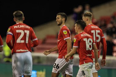 Barnsley 'den 26 numaralı Ziyad Larkeche, 20 Eylül 202' de Oakwell, Barnsley, İngiltere 'de oynanan Papa John' s Trophy maçında 2-0 kazanma hedefini kutluyor.