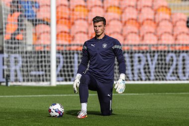 Blackpool 'dan Stuart Moore # 13, Blackpool' da oynanan Blackpool-Norwich City maçında oynanan maç öncesi ısınma maçı sırasında 1 Ekim 202