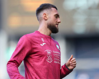 Swansea City 'den Matt Grimes, West Bromwich Albion, The Hawthorns, West Bromwich, İngiltere' de 1 Ekim 202 'de Swansea City' ye karşı oynadığı maçta ısınıyor.