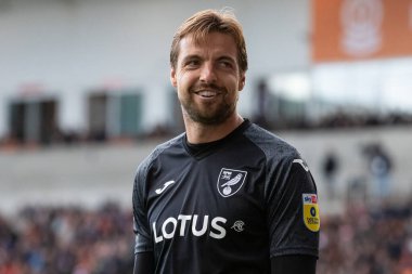 Norwich City 'den Tim Krul # 1 Blackpool taraftarlarına 21 Ekim 202' de Bloomfield Road, Blackpool, İngiltere 'de oynanan Blackpool-Norwich maçında gürültü yapmamalarını söyledi.