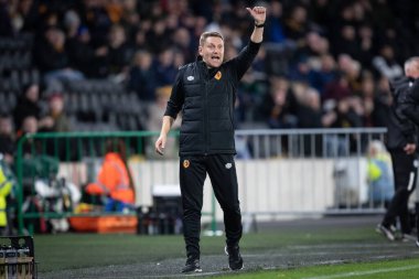 İlk takım koçu Andy Dawson, 5 Ekim 202 'de MKM Stadyumu' nda Hull City 'nin Wigan Athletic' e karşı oynadığı Sky Bet Şampiyonası 'nda jest yapıyor ve tepki veriyor.