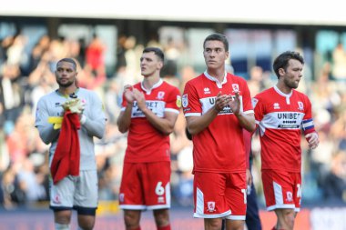 Middlesbrough 'dan Matthew Hoppe # 13, 8 Ekim 202' de Londra 'nın başkenti The Den' de oynanan Sky Bet Şampiyonası karşılaşmasında taraftarlarını kabul ediyor.