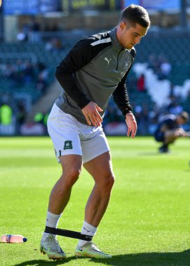 Plymouth Argyle orta saha oyuncusu Conor Grant (15), 8 Ekim 202 'de Home Park, Plymouth, İngiltere' de oynanan Sky Bet League 1 karşılaşmasında ısınma turunda Plymouth Argyle ile Accrington Stanley karşı karşıya geldi.