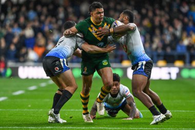 Avustralyalı Latrell Mitchell, Rugby Ligi Dünya Kupası 2021 Dünya Kupası 'nda Mitieli Vulikijapani ve Fiji' li Brandon Wakeham tarafından Headingley Stadyumu 'nda oynanan karşılaşmada yenildi.